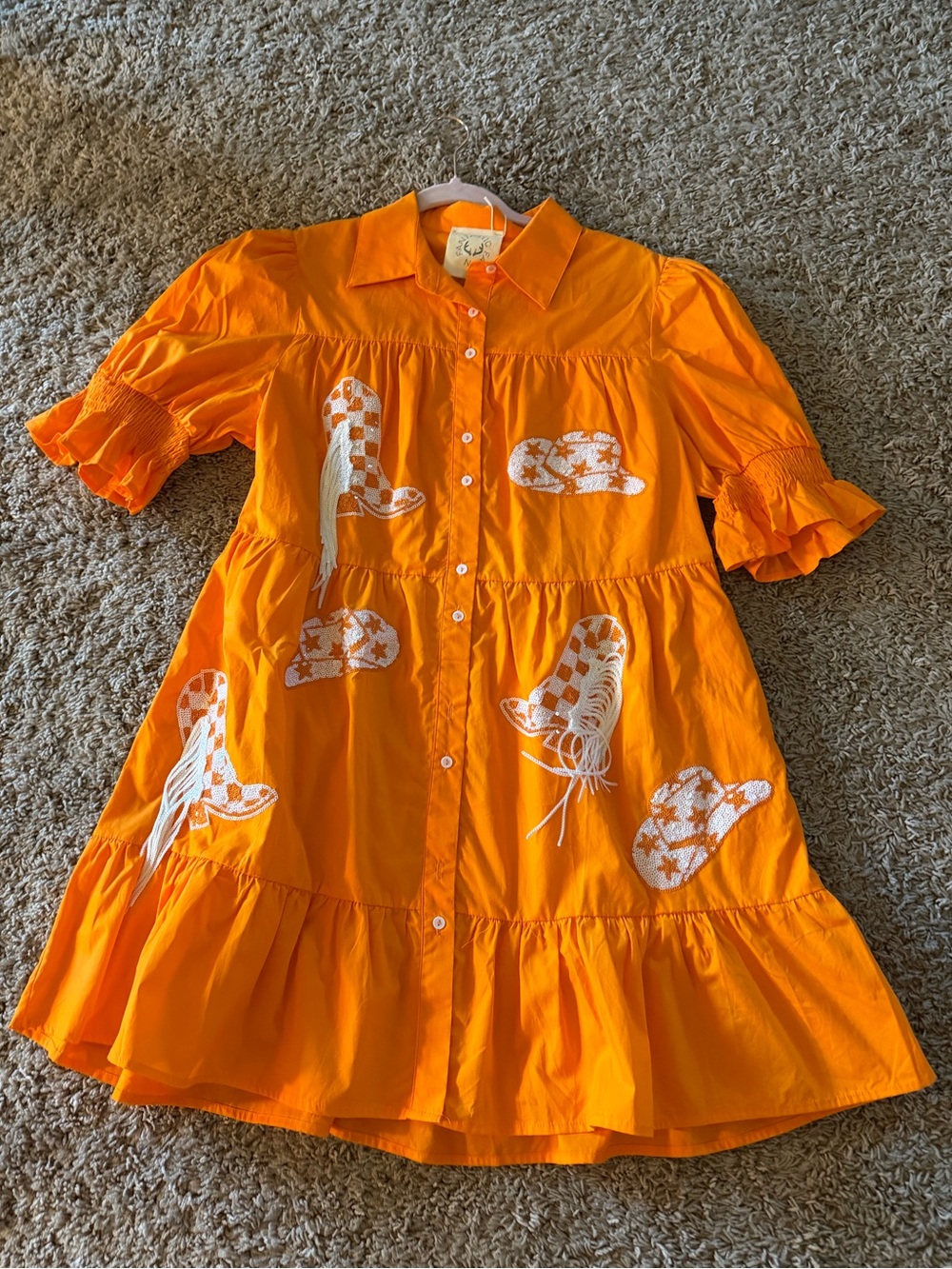 Bright orange dress with sequin patches